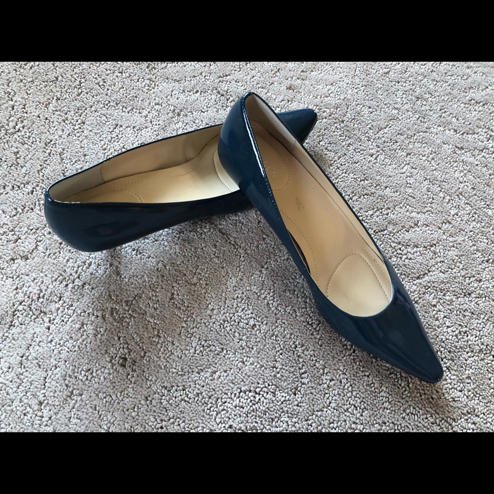Blue-ish Calvin Klein pumps